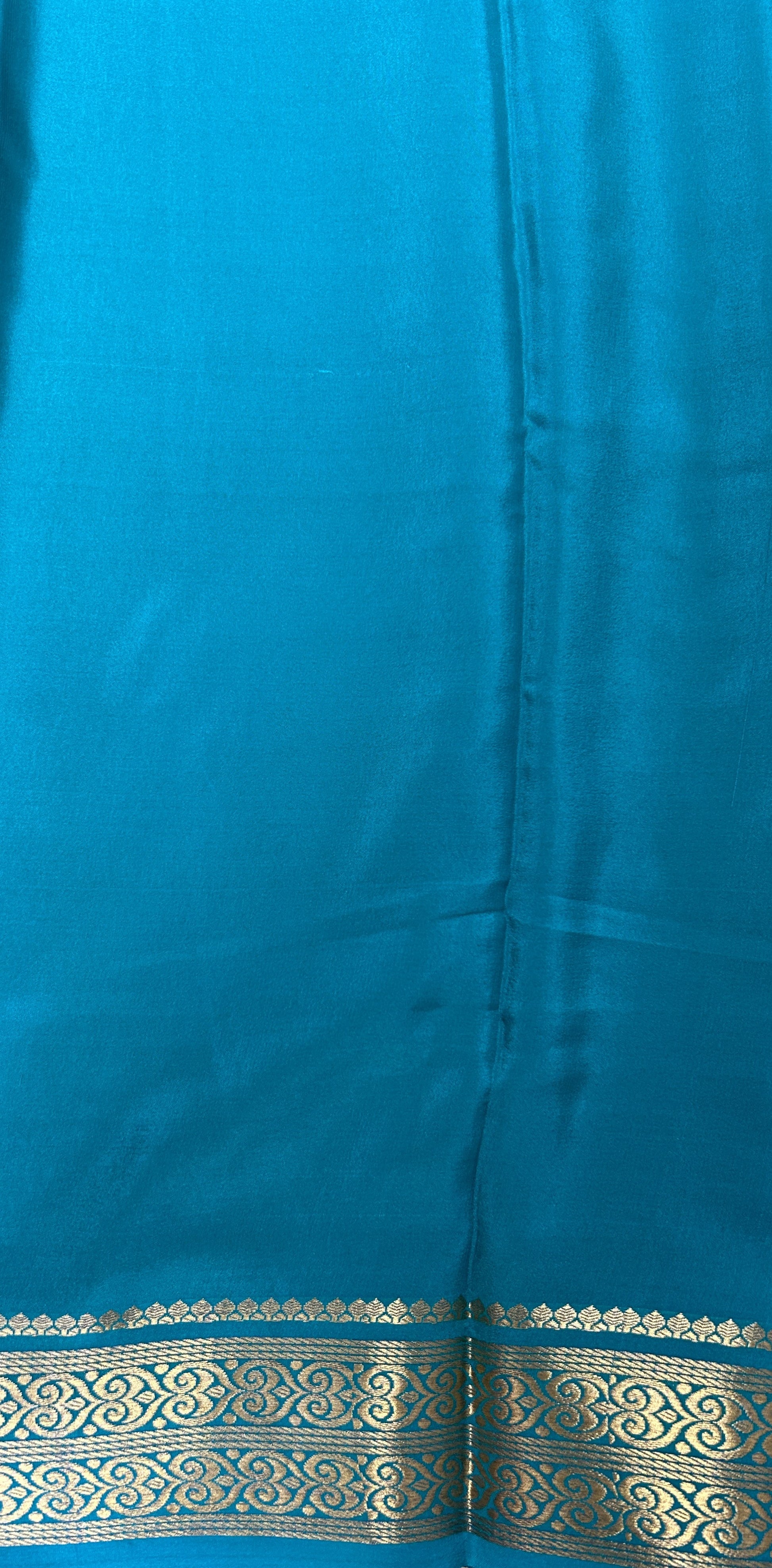 Mysore Crepe Silk Saree Pastel Green Colored Complemented with a Sea Green Zari Border. - Sampradaya Designer Studio