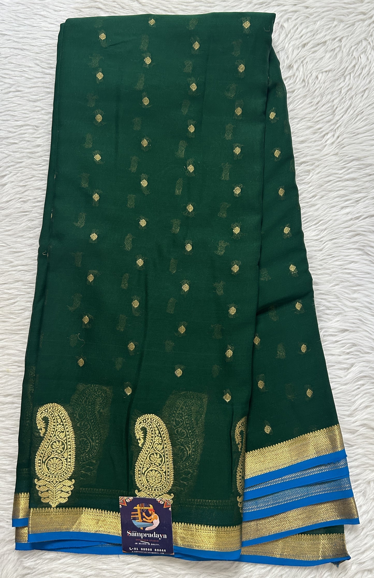 Mysore Crepe Silk Saree Bottle Green Colored Complemented with a Zari Border. - Sampradaya Designer Studio