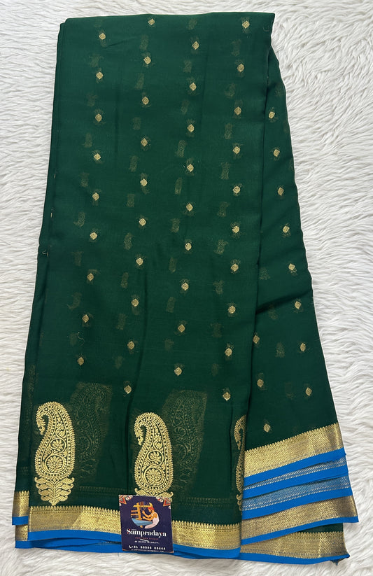 Mysore Crepe Silk Saree Bottle Green Colored Complemented with a Zari Border. - Sampradaya Designer Studio