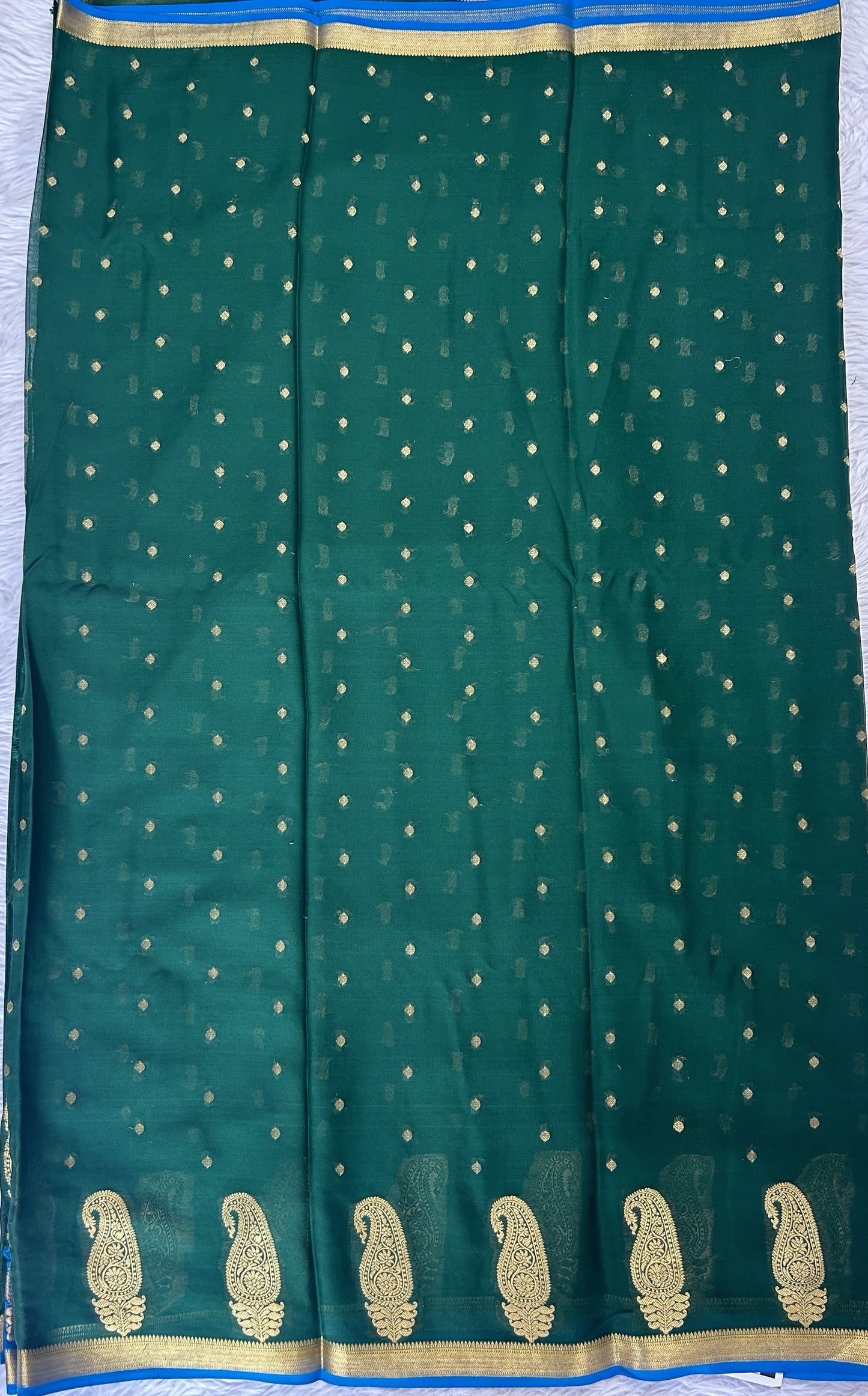 Mysore Crepe Silk Saree Bottle Green Colored Complemented with a Zari Border. - Sampradaya Designer Studio