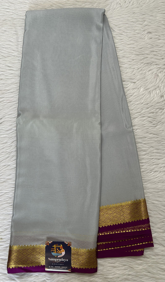 Mysore Crepe Silk Saree Light Gray Colored Complemented with a Pink Zari Border. - Sampradaya Designer Studio