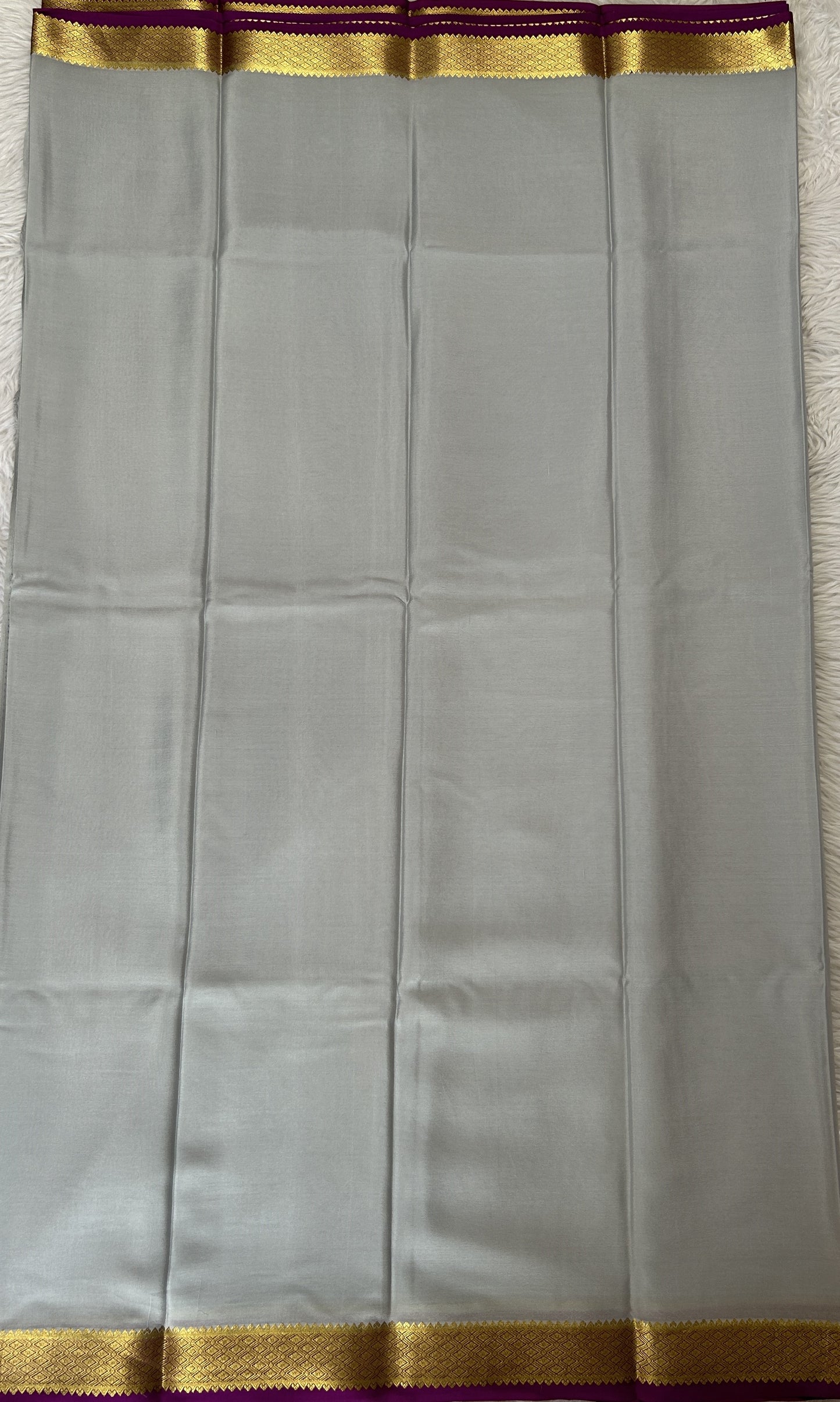 Mysore Crepe Silk Saree Light Gray Colored Complemented with a Pink Zari Border. - Sampradaya Designer Studio