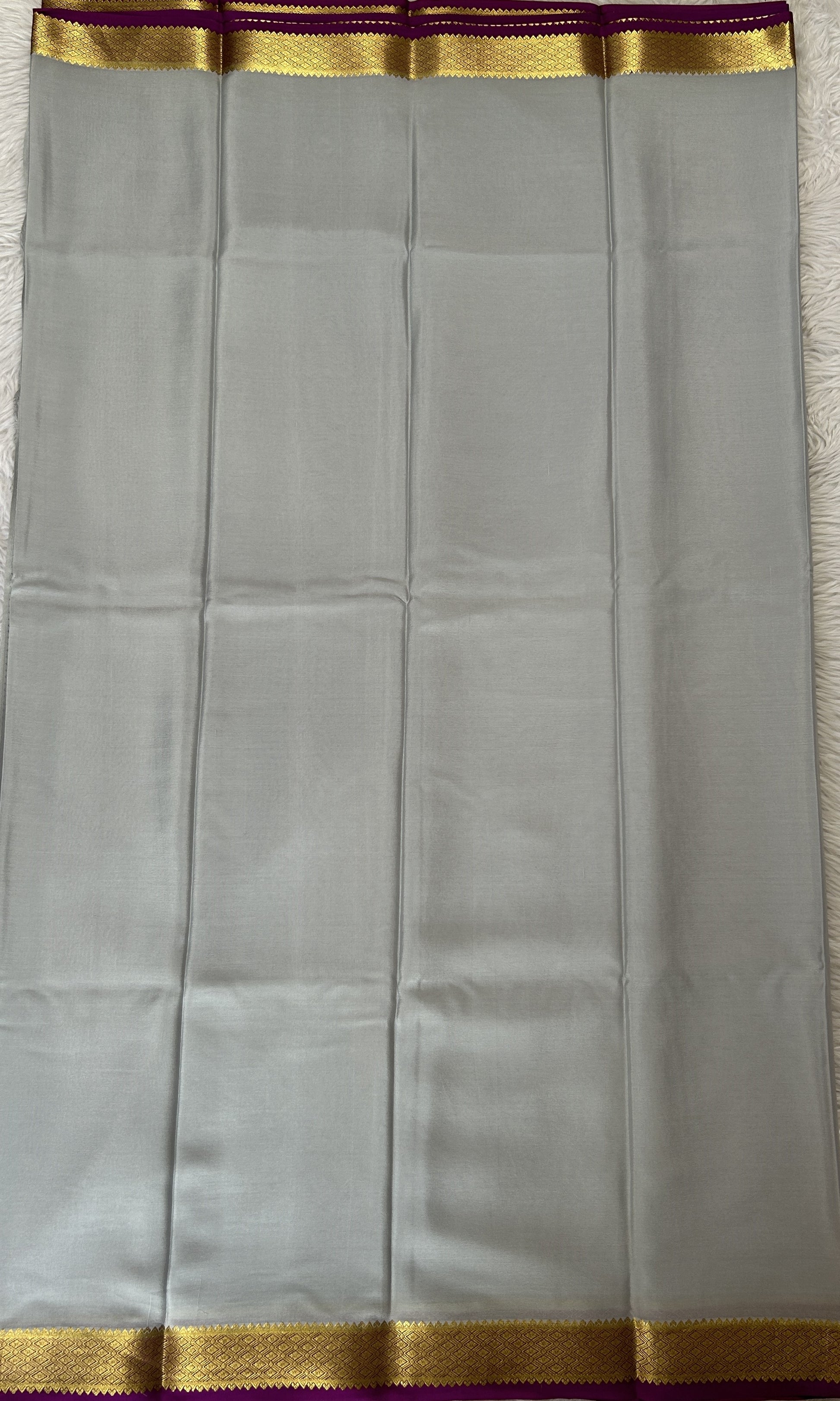 Mysore Crepe Silk Saree Light Gray Colored Complemented with a Pink Zari Border. - Sampradaya Designer Studio