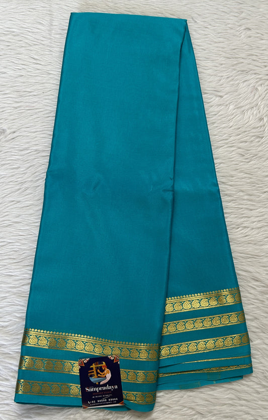 Mysore Crepe Silk Saree Sea Blue Colored Complemented with a Zari Gap Border. - Sampradaya Designer Studio