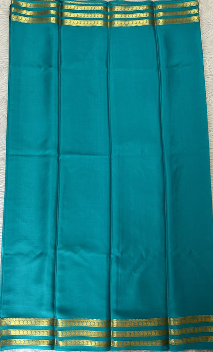 Mysore Crepe Silk Saree Sea Blue Colored Complemented with a Zari Gap Border. - Sampradaya Designer Studio