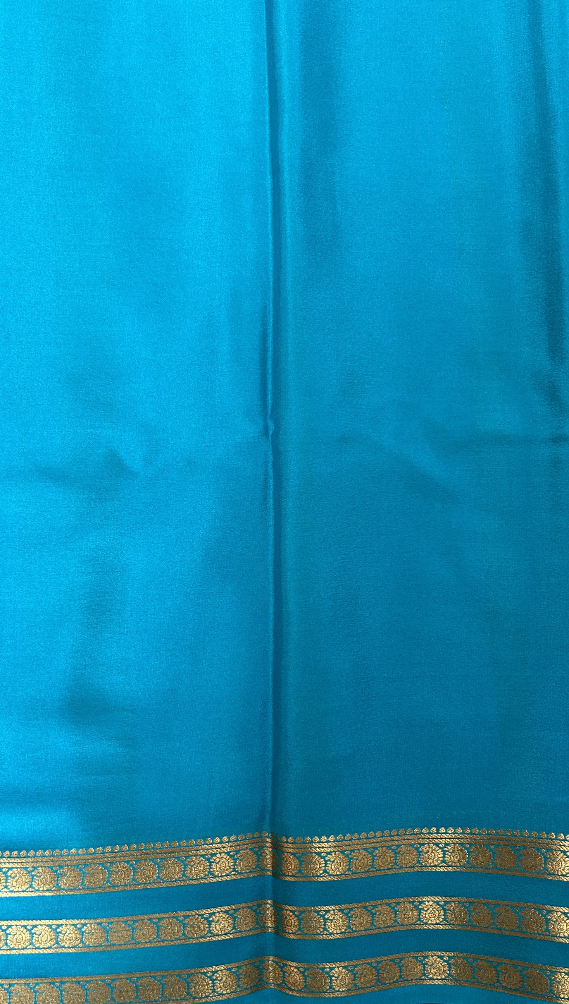 Mysore Crepe Silk Saree Sea Blue Colored Complemented with a Zari Gap Border. - Sampradaya Designer Studio
