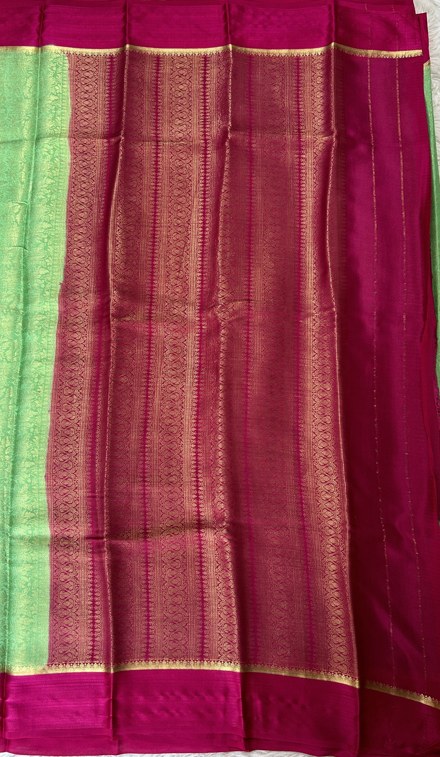 Mysore Crepe Silk Saree Green Colored Complemented with a Pink Zari Border. - Sampradaya Designer Studio
