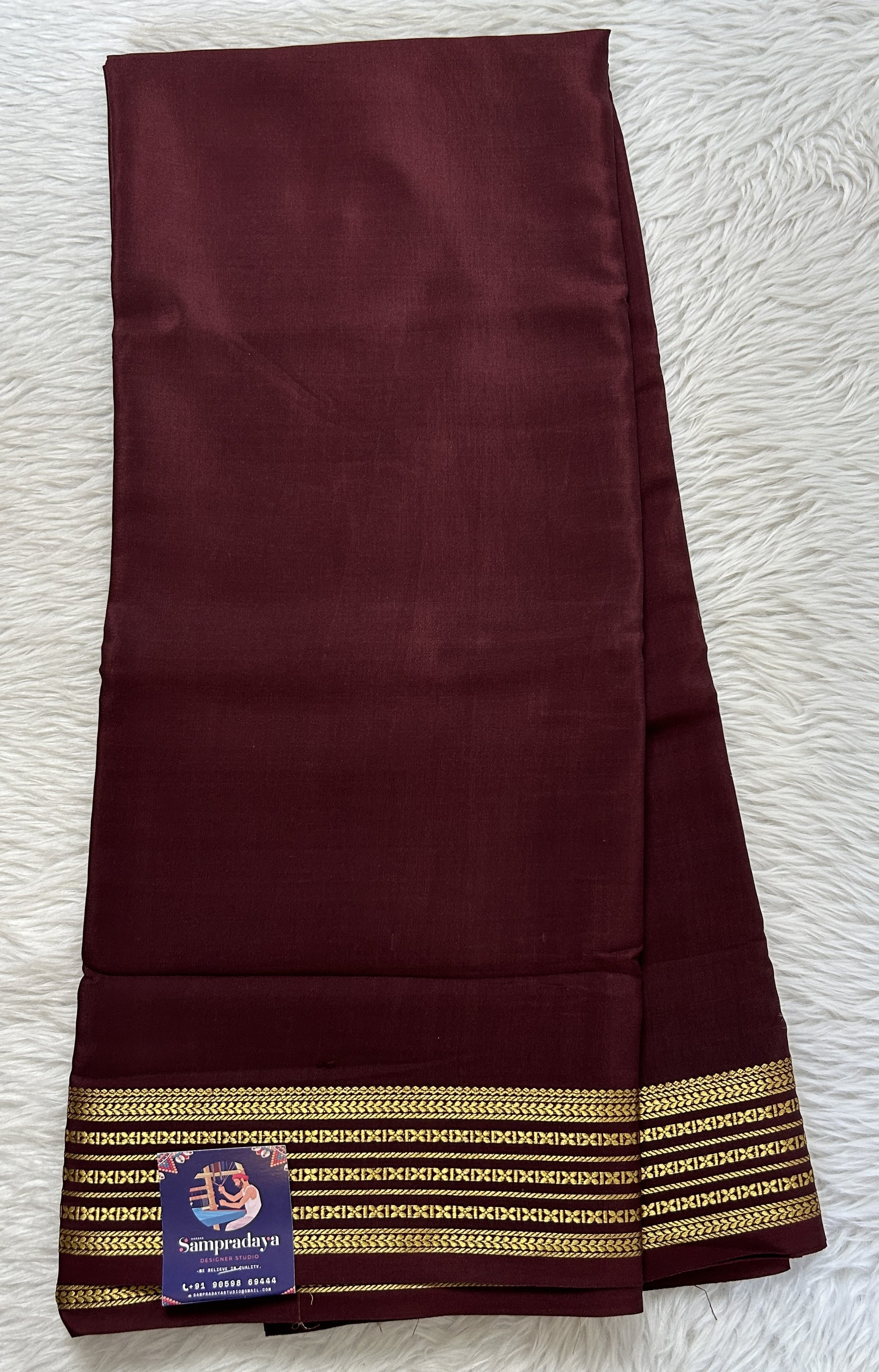 Mysore Crepe Silk Saree Brown Colored Complemented with a Zari Border. - Sampradaya Designer Studio