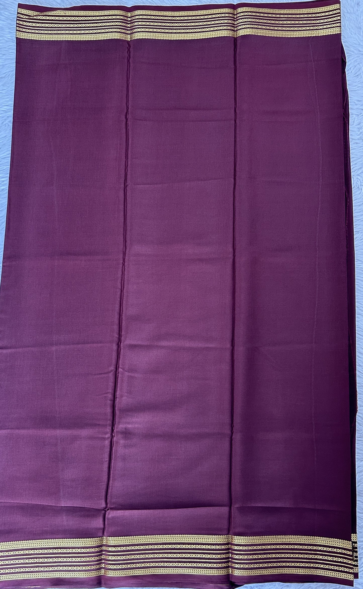 Mysore Crepe Silk Saree Brown Colored Complemented with a Zari Border. - Sampradaya Designer Studio
