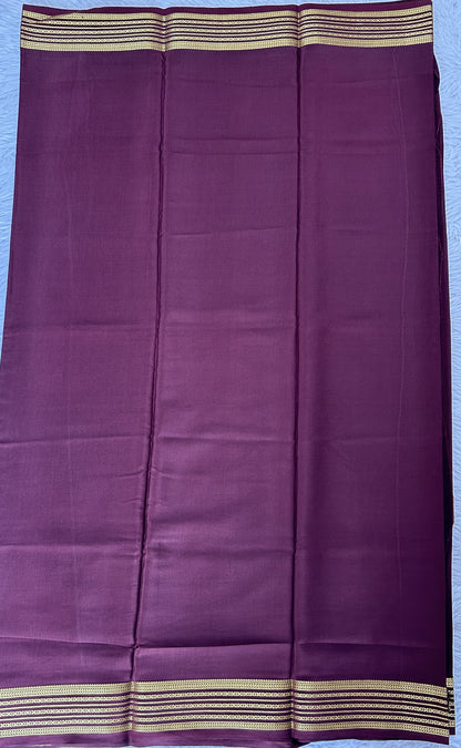 Mysore Crepe Silk Saree Brown Colored Complemented with a Zari Border. - Sampradaya Designer Studio