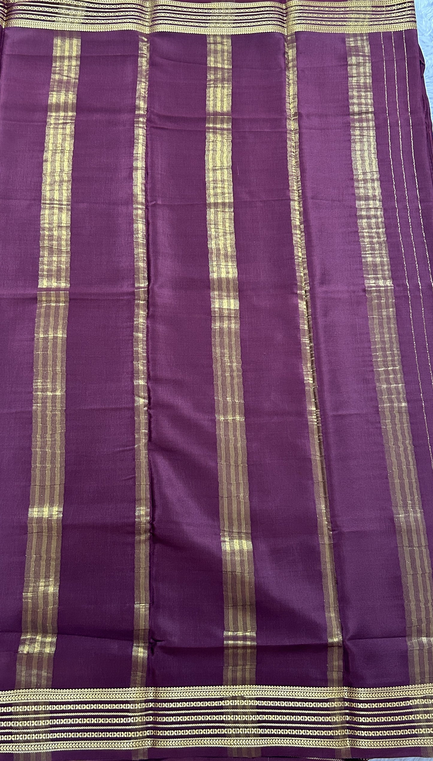Mysore Crepe Silk Saree Brown Colored Complemented with a Zari Border. - Sampradaya Designer Studio