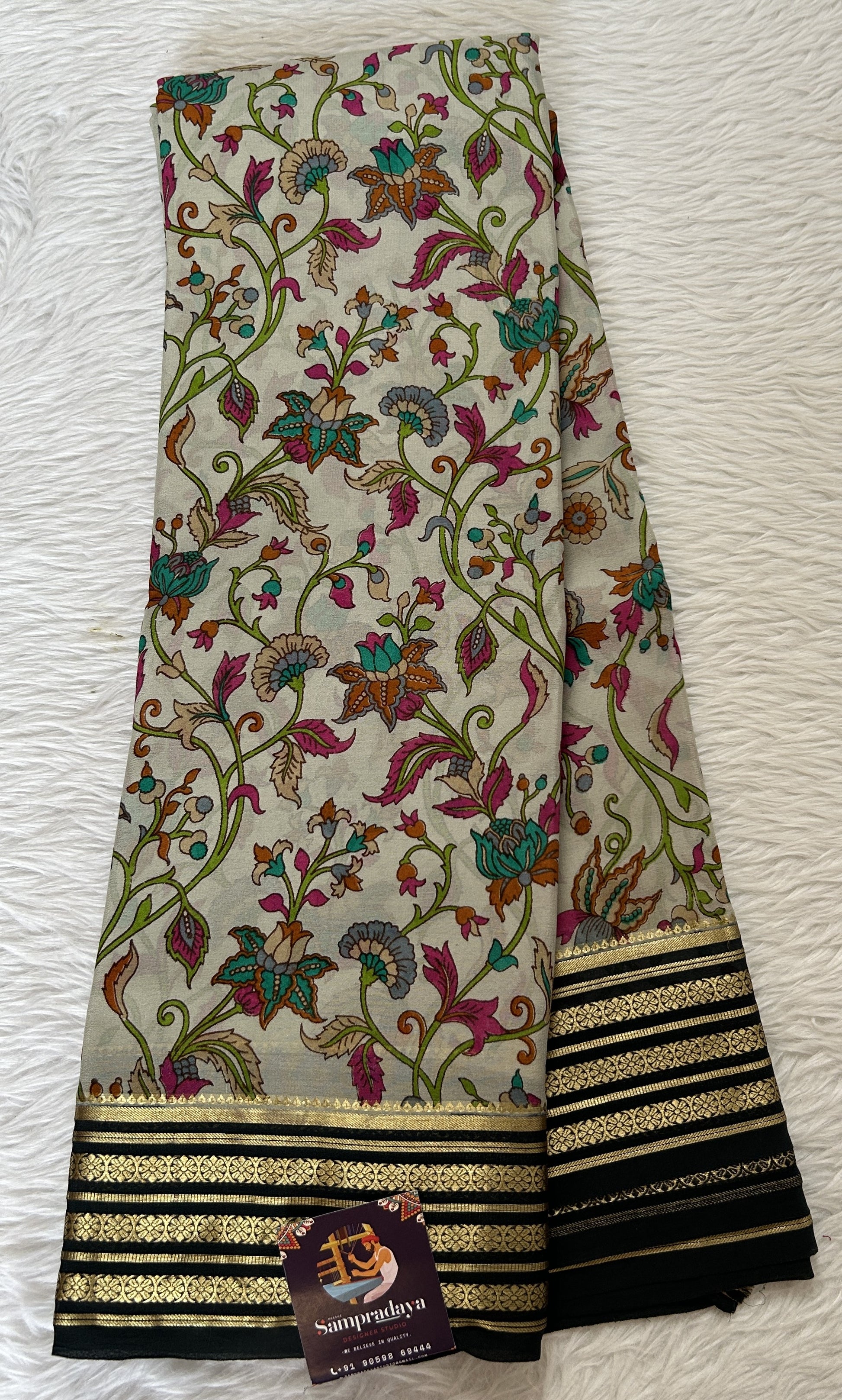 Mysore Crepe Silk Saree Light Gray Colored Complemented with a Black Zari Border. - Sampradaya Designer Studio