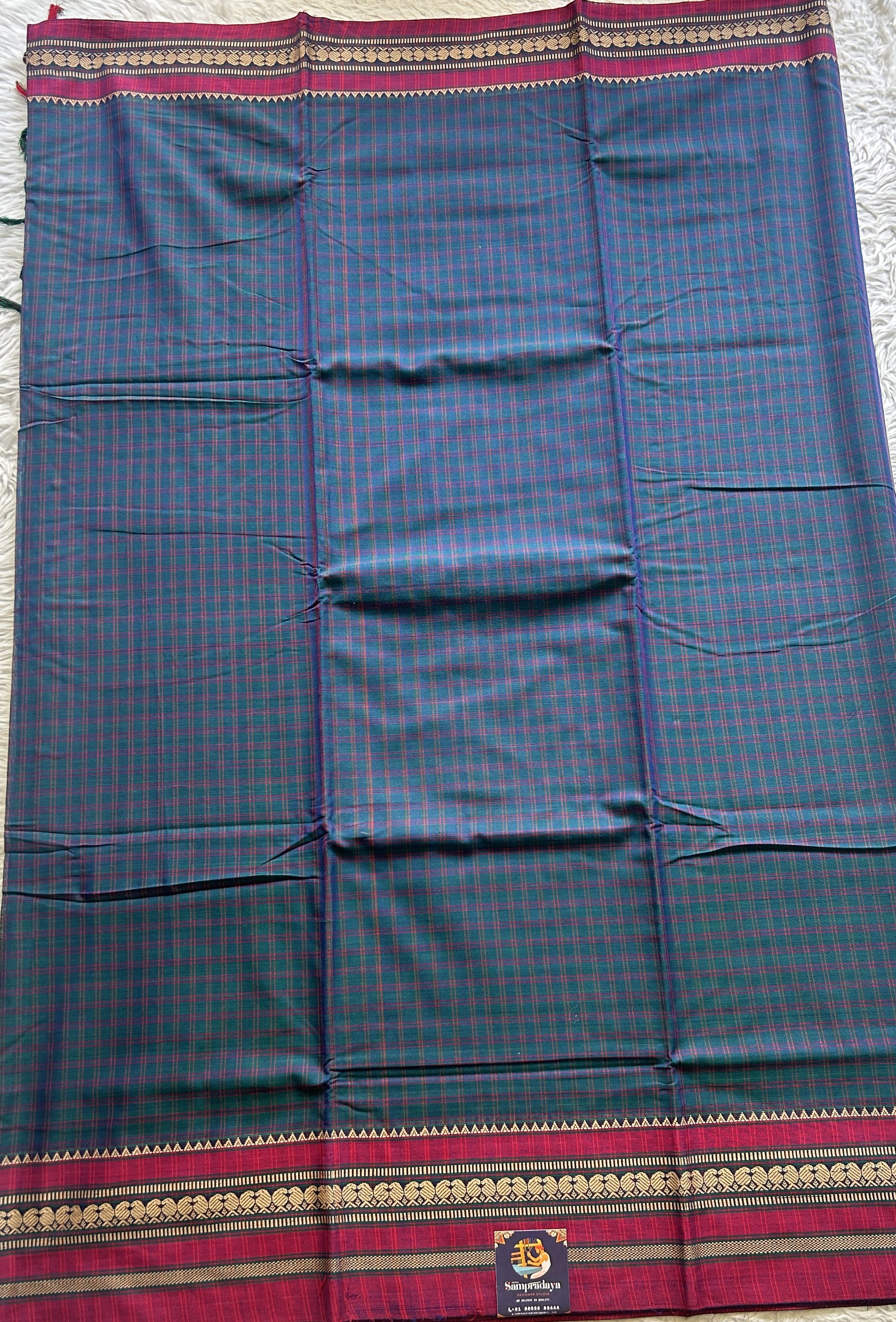 Narayanpet Cotton Checks Saree Peacock Blue Colored Complemented with a Pink Thread Border. - Sampradaya Designer Studio