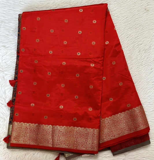 Semi Raw Silk Saree Red Colored Complemented with a Zari Border. - Sampradaya Designer Studio