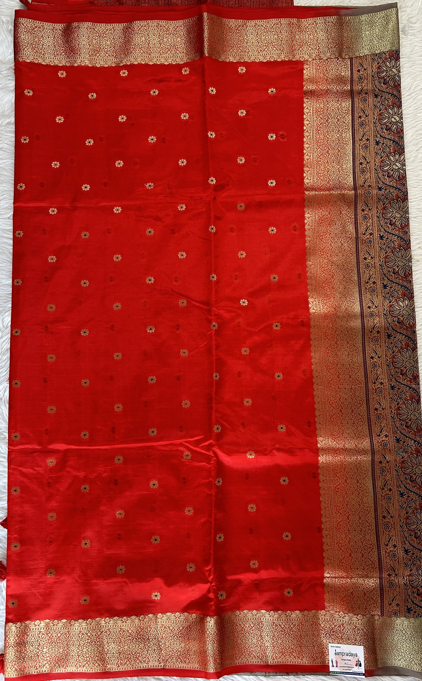 Semi Raw Silk Saree Red Colored Complemented with a Zari Border. - Sampradaya Designer Studio