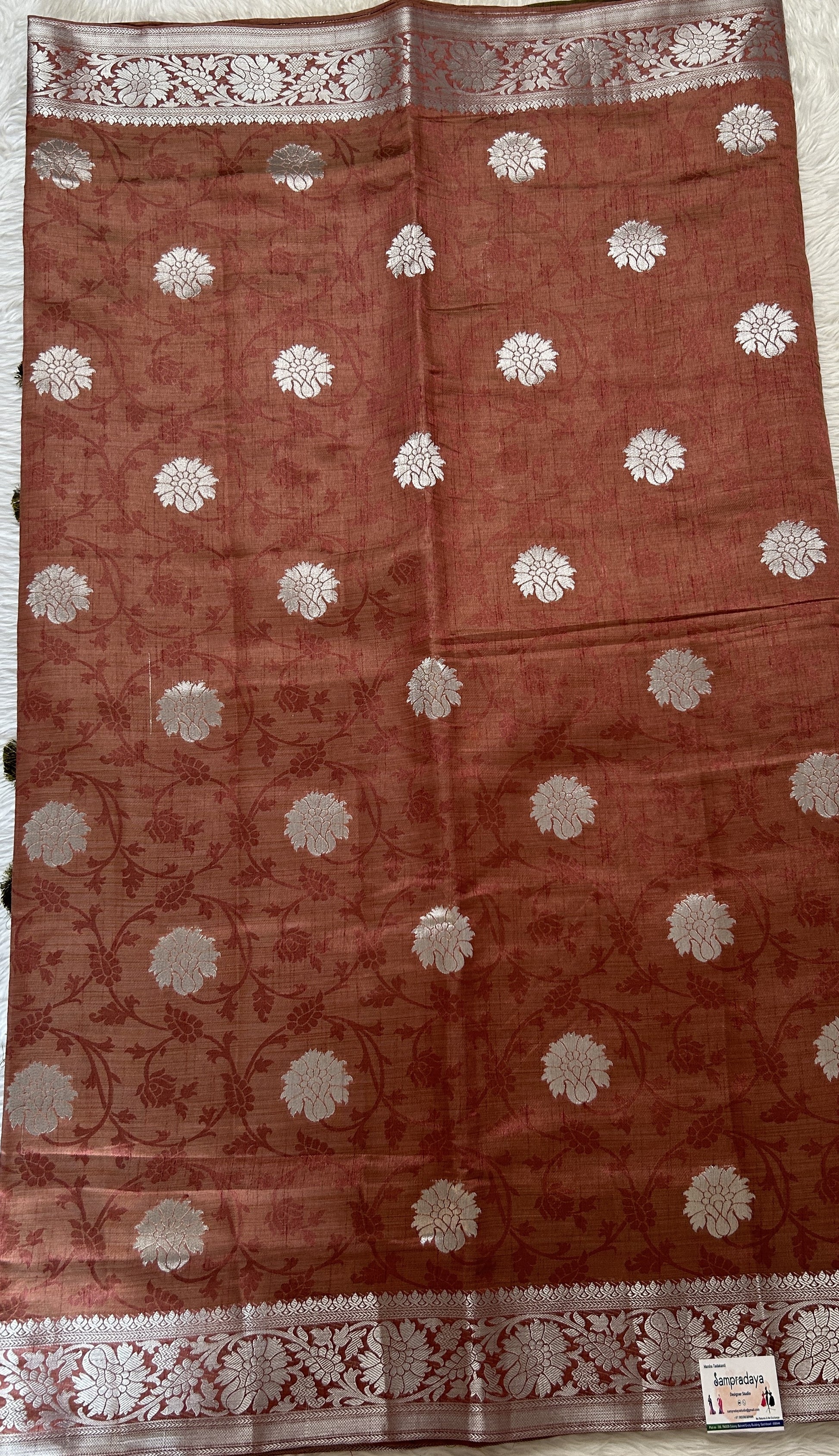 Semi Raw Silk Saree Rust Colored Complemented with a Zari Border. - Sampradaya Designer Studio