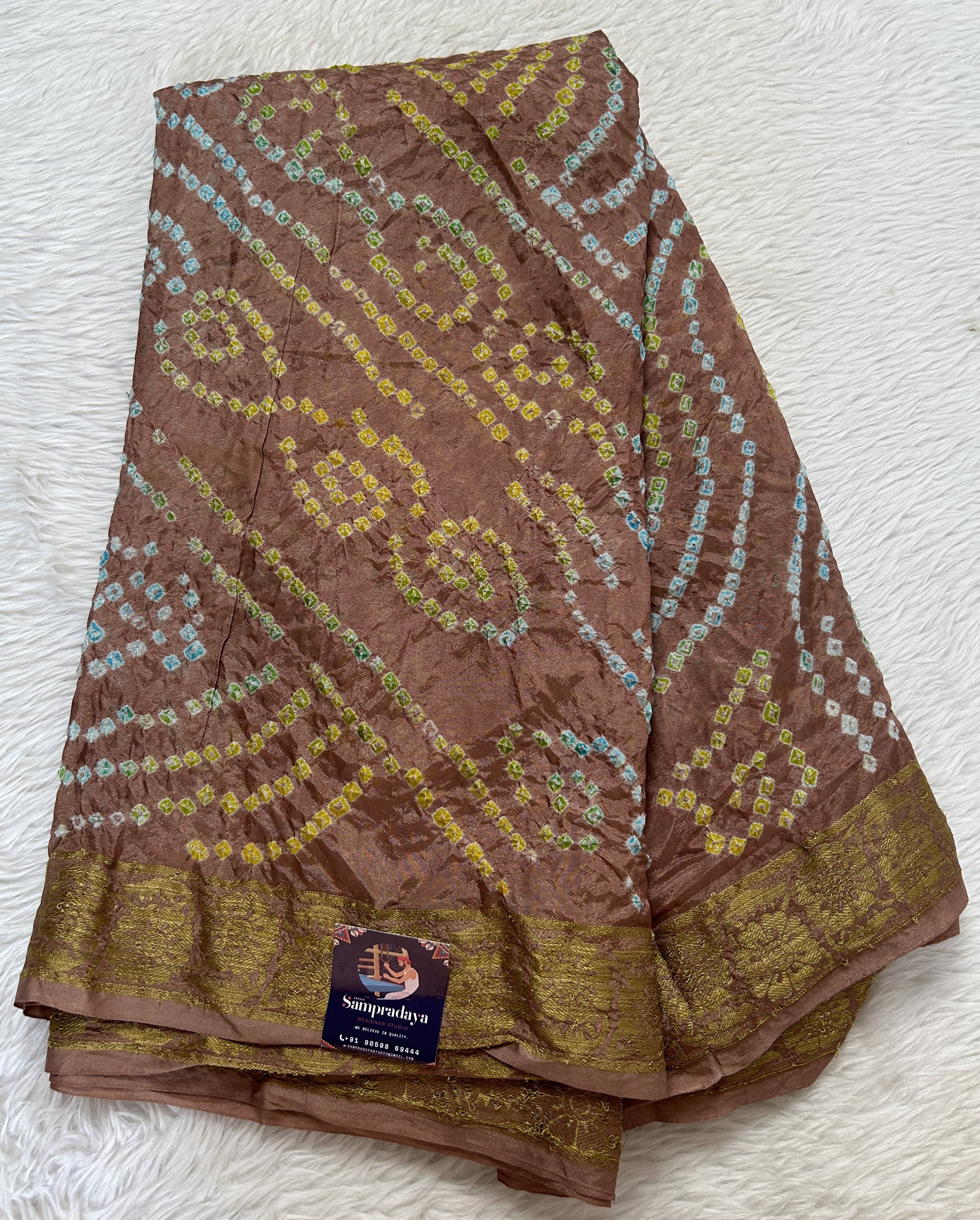 Bandhani Saree Pastel Brown Color Complemented with a Zari Border ...