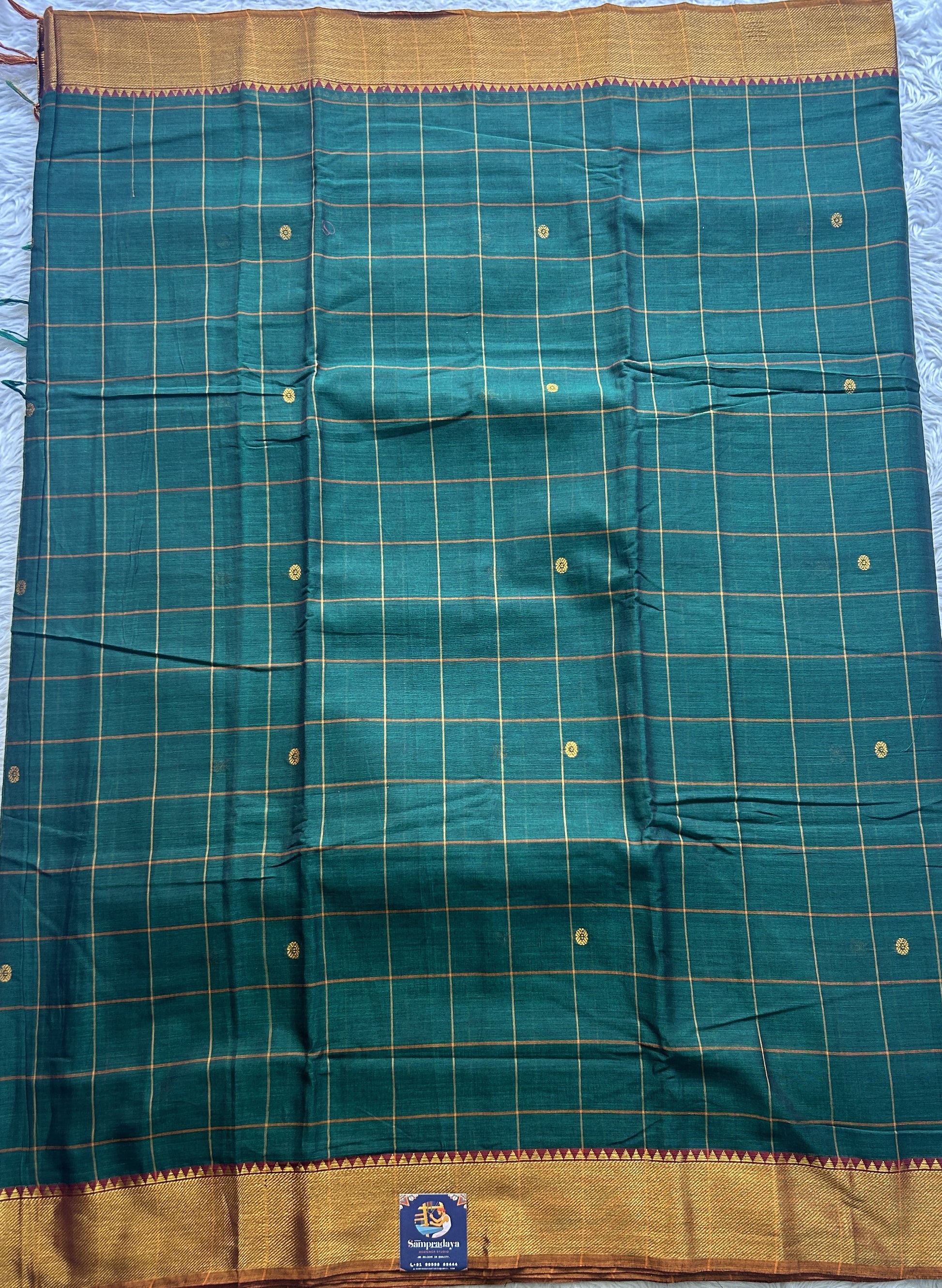 Narayanpet Cotton Checks Saree Bottle Green Colored Complemented with a Zari Border. - Sampradaya Designer Studio