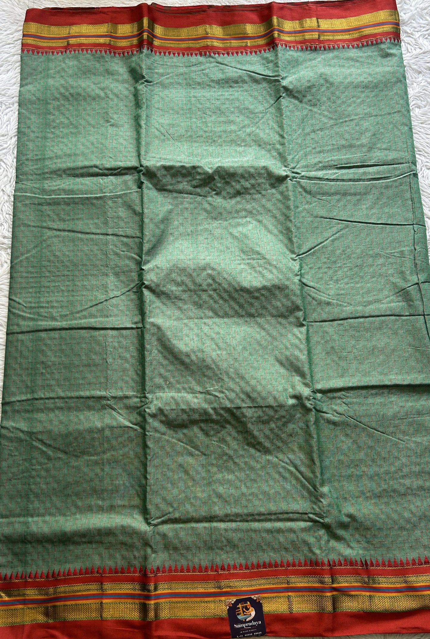 Narayanpet Cotton Saree Light Green Colored Complemented with a Zari Border. - Sampradaya Designer Studio