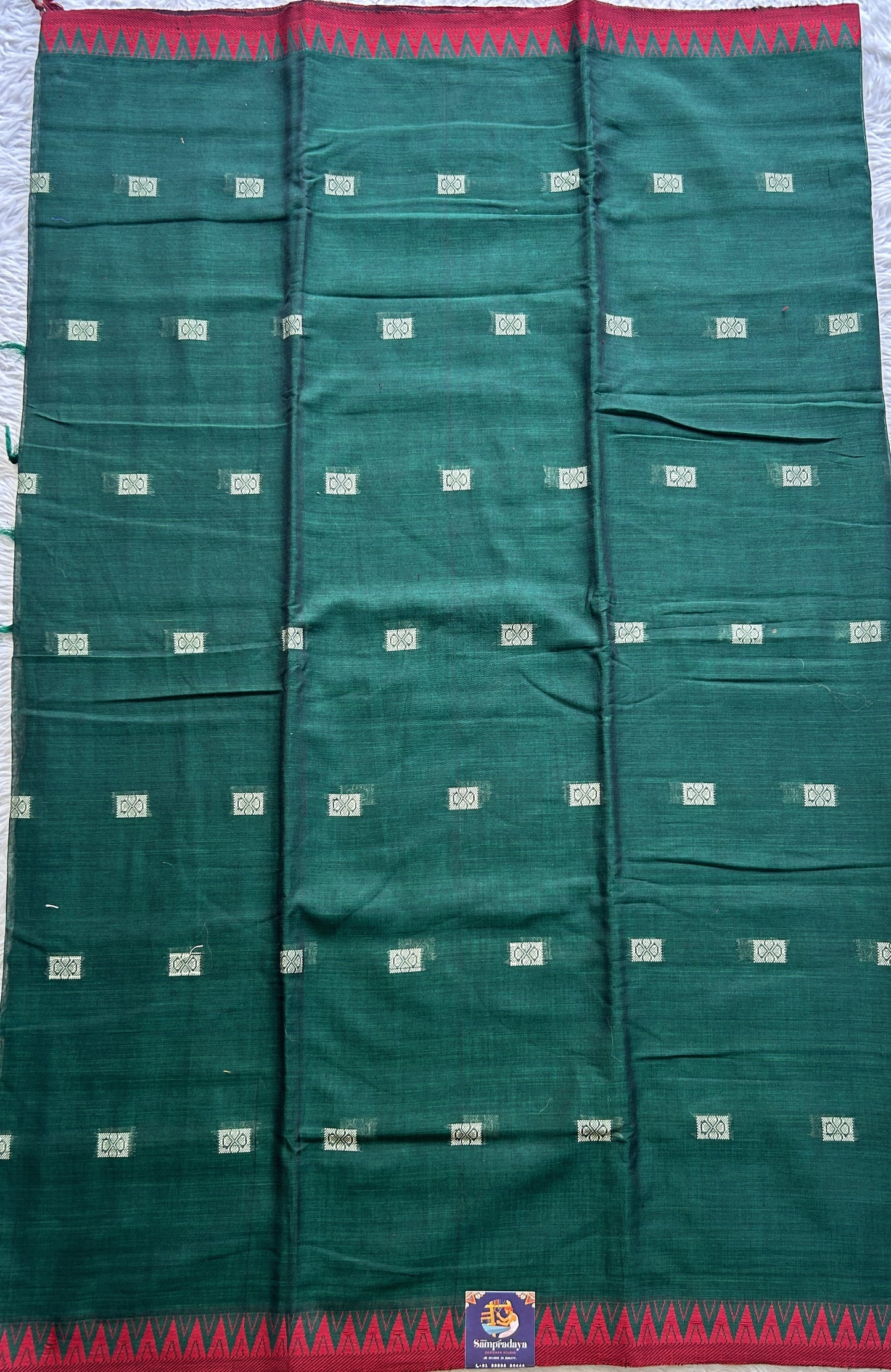 Narayanpet Cotton Buti Saree Dark Green Colored Complemented with a Thread Border. - Sampradaya Designer Studio