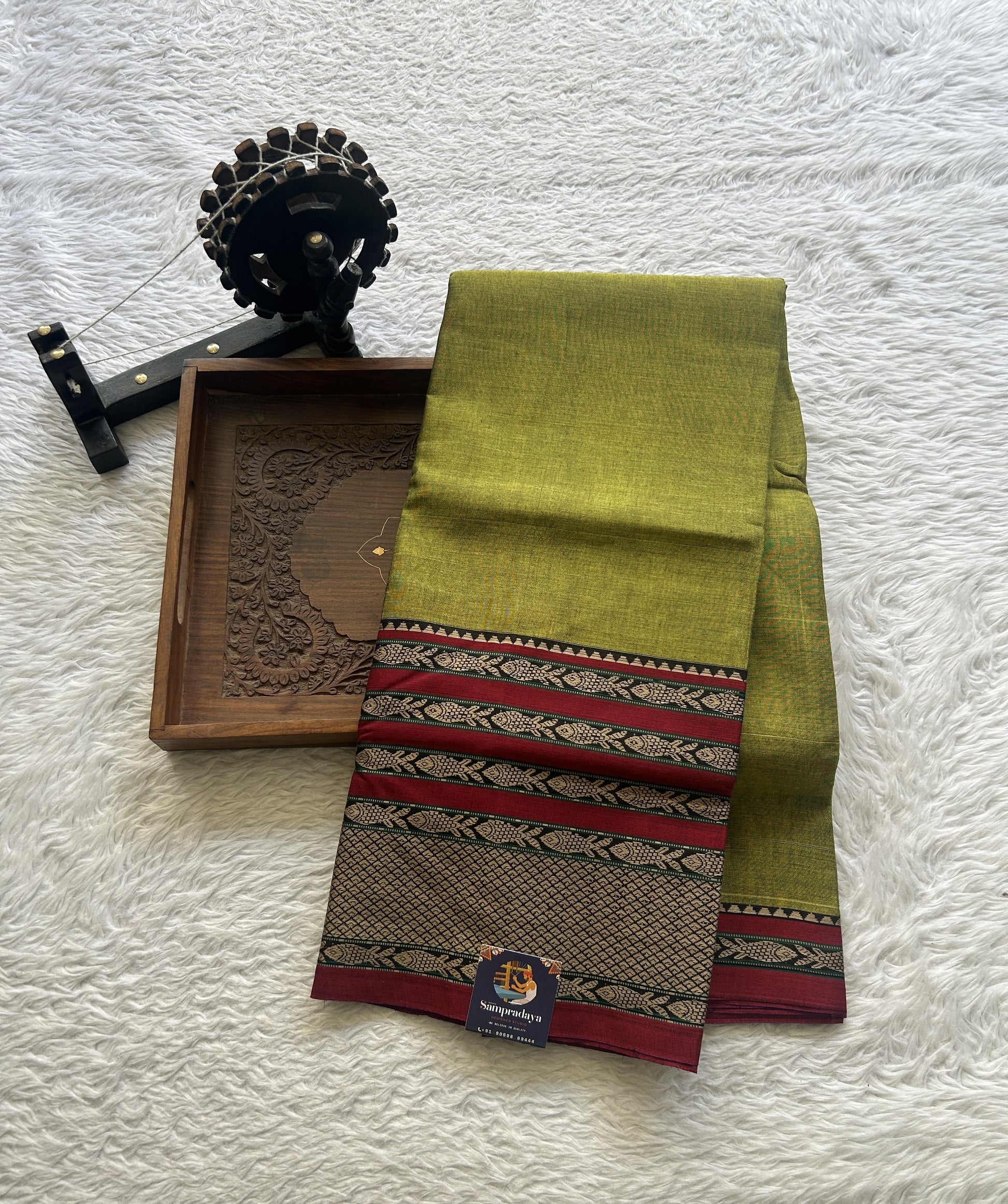 Narayanpet Cotton Saree Olive Green Colored Complemented with a Gap Border. - Sampradaya Designer Studio