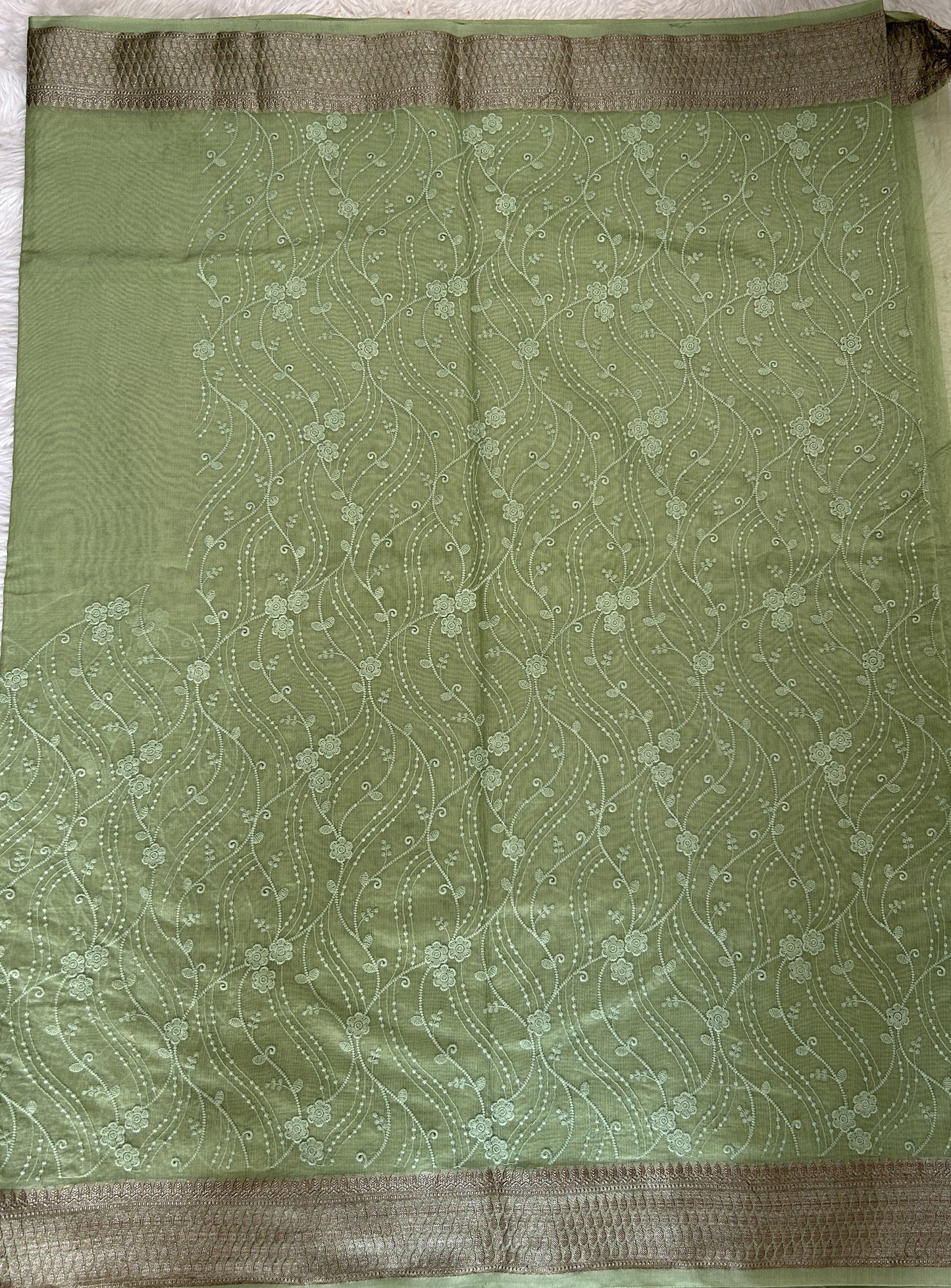 Semi Tussar Silk Saree Green colored complemented with a Zari border. - Sampradaya Designer Studio