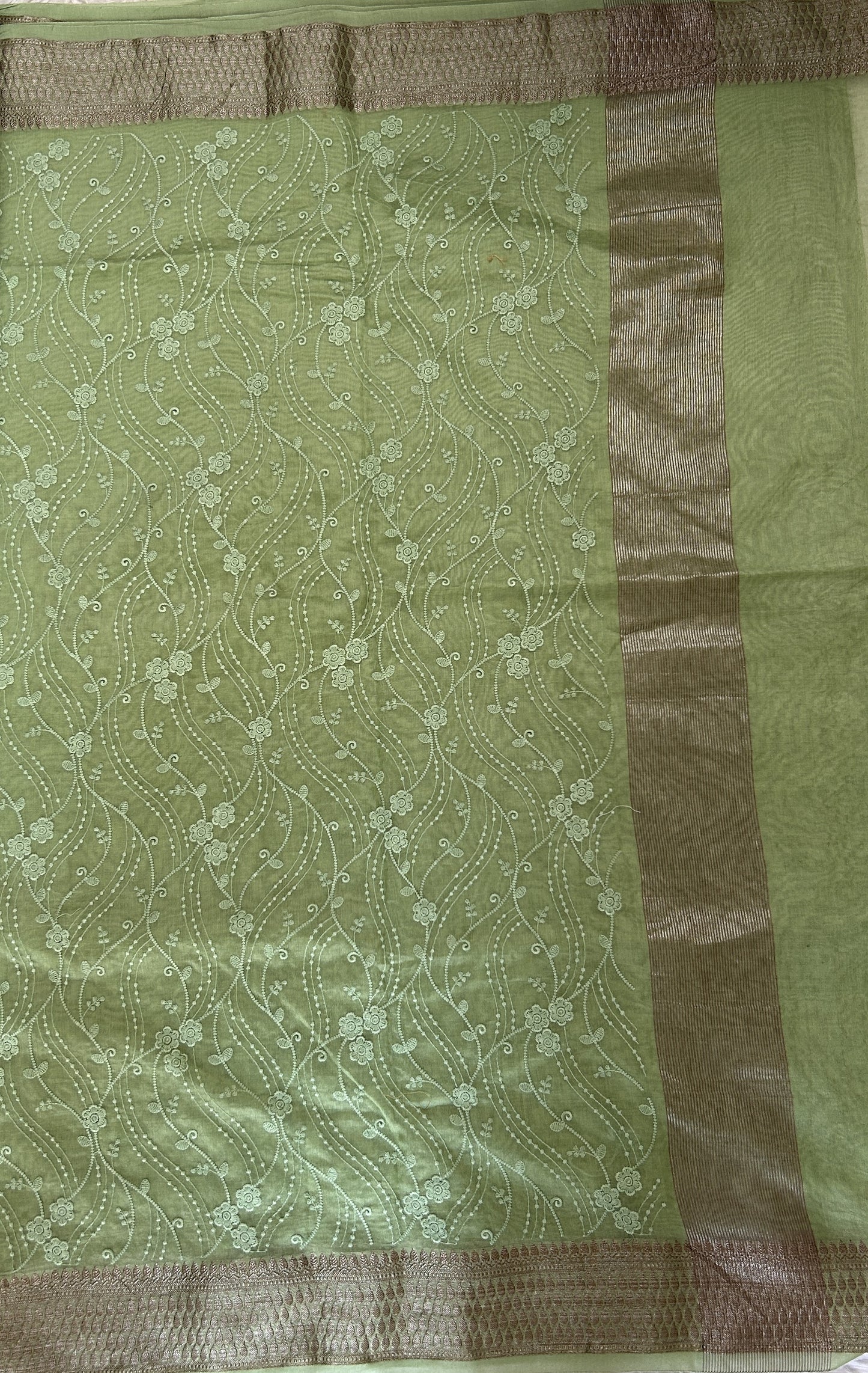 Semi Tussar Silk Saree Green colored complemented with a Zari border. - Sampradaya Designer Studio