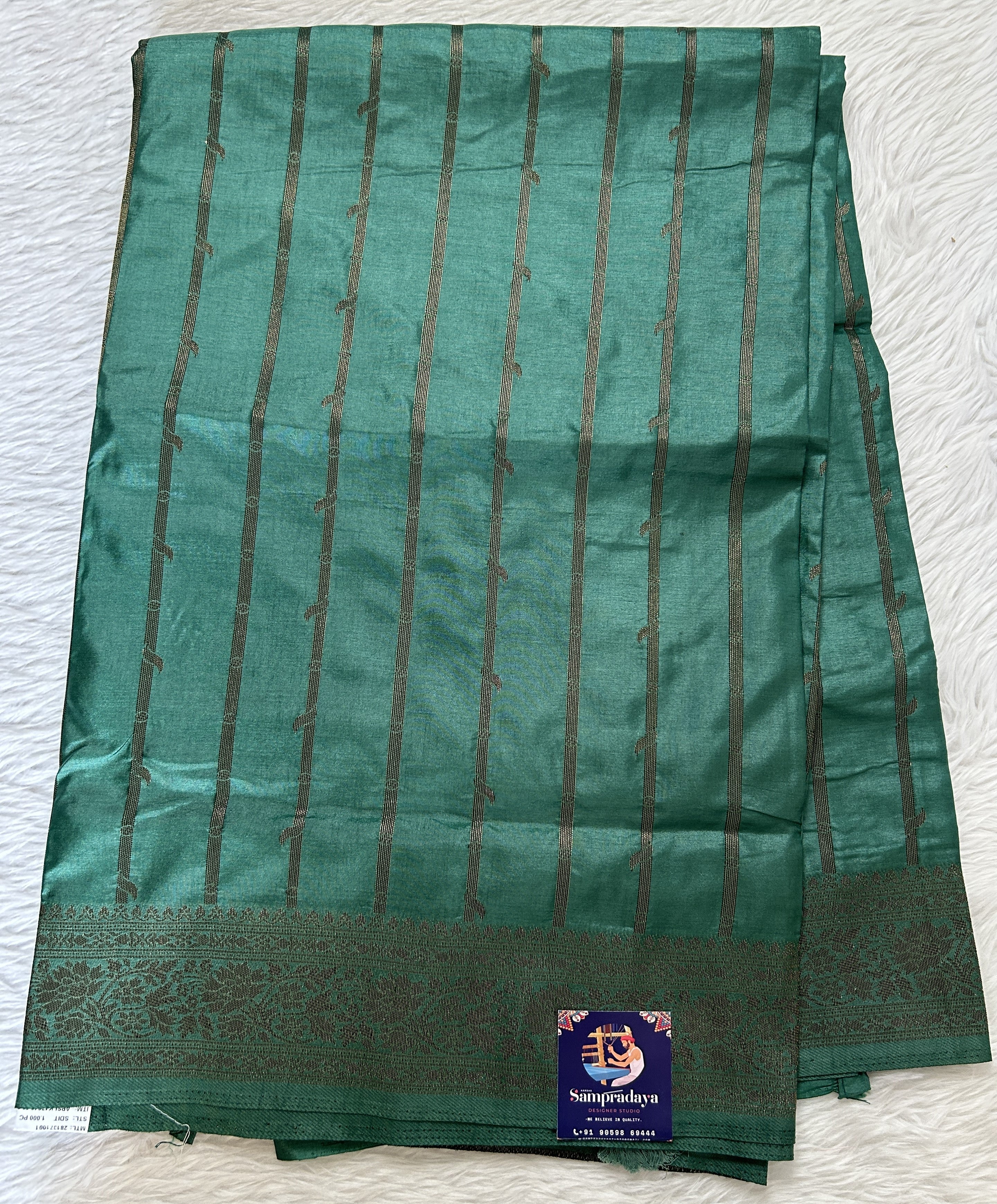 Semi Raw Silk Saree Castleton Green Color with a Zari Border ...