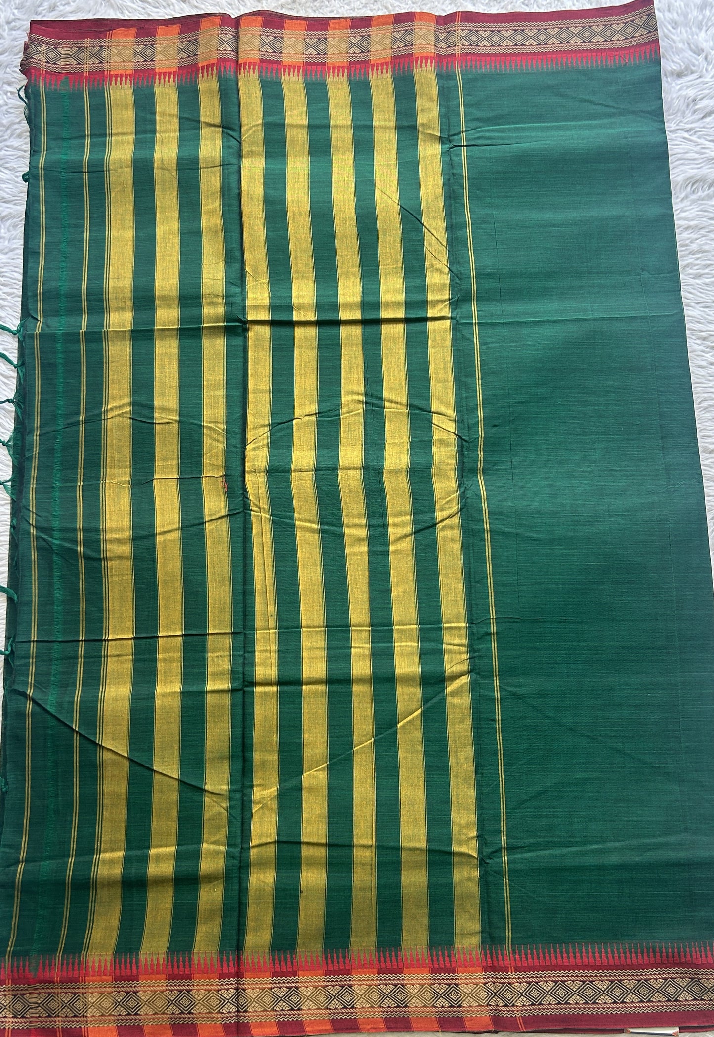 Narayanpet Cotton Saree Bottle Green Colored Complemented with a Thread Border. - Sampradaya Designer Studio