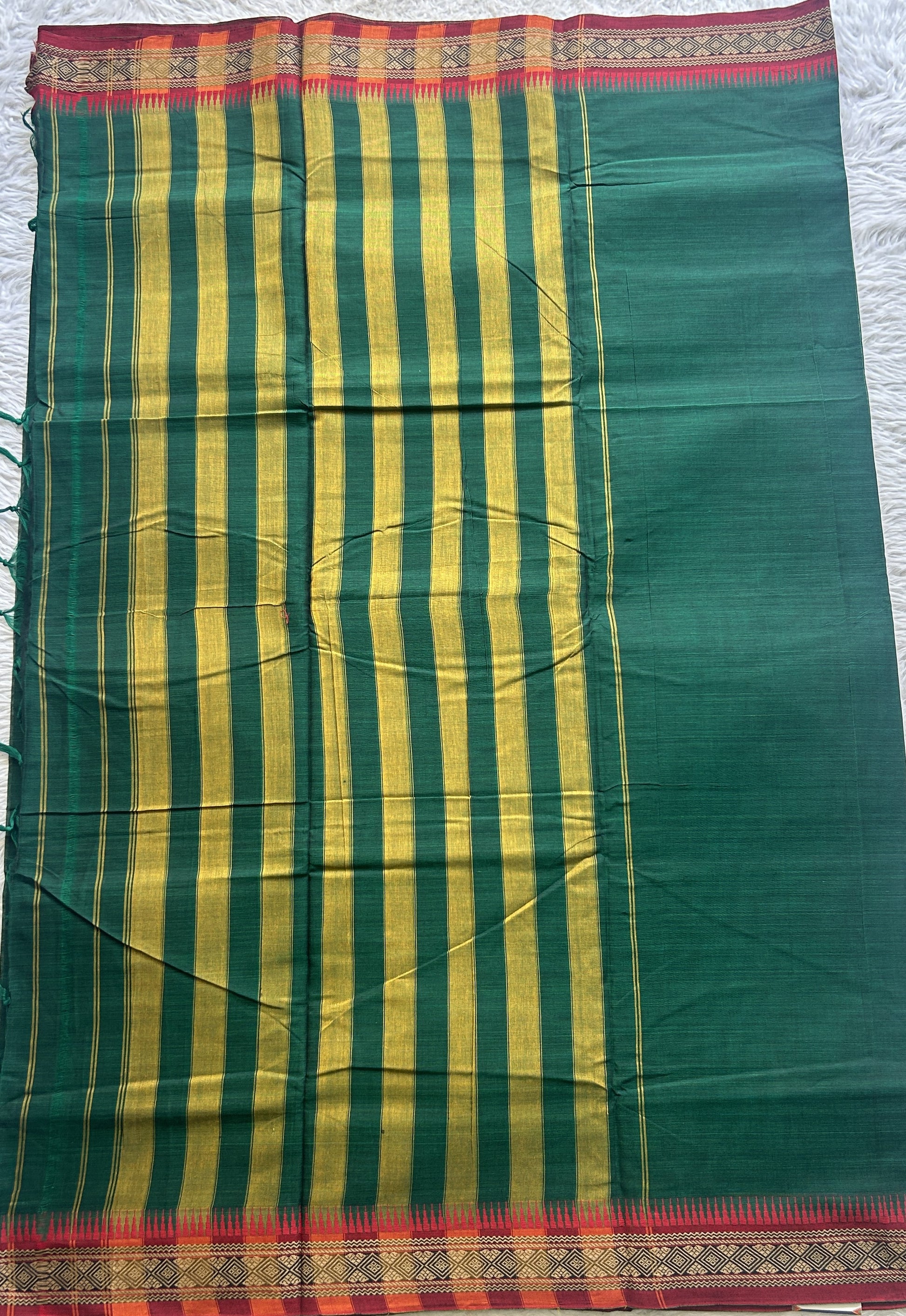 Narayanpet Cotton Saree Bottle Green Colored Complemented with a Thread Border. - Sampradaya Designer Studio