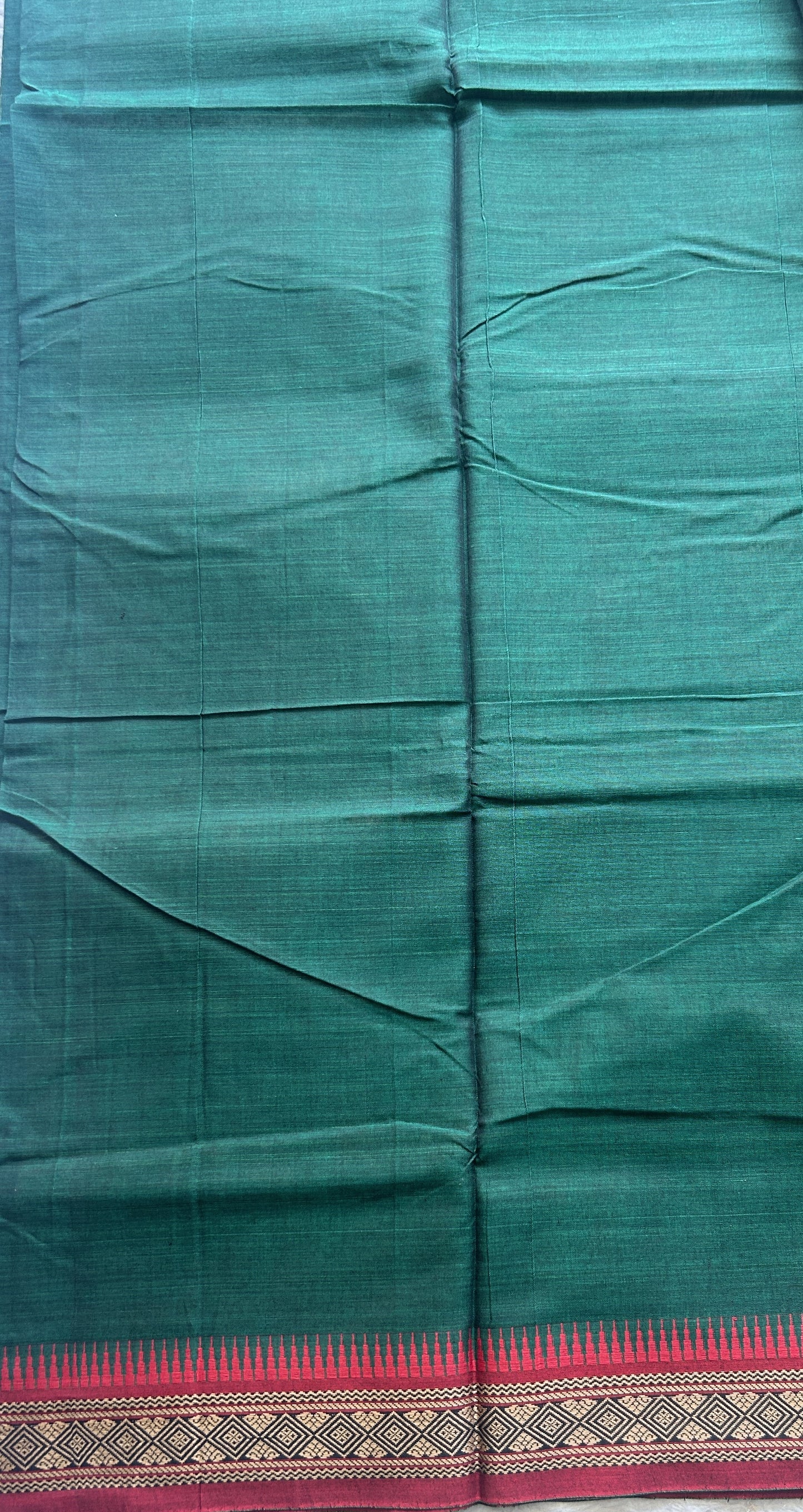 Narayanpet Cotton Saree Bottle Green Colored Complemented with a Thread Border. - Sampradaya Designer Studio