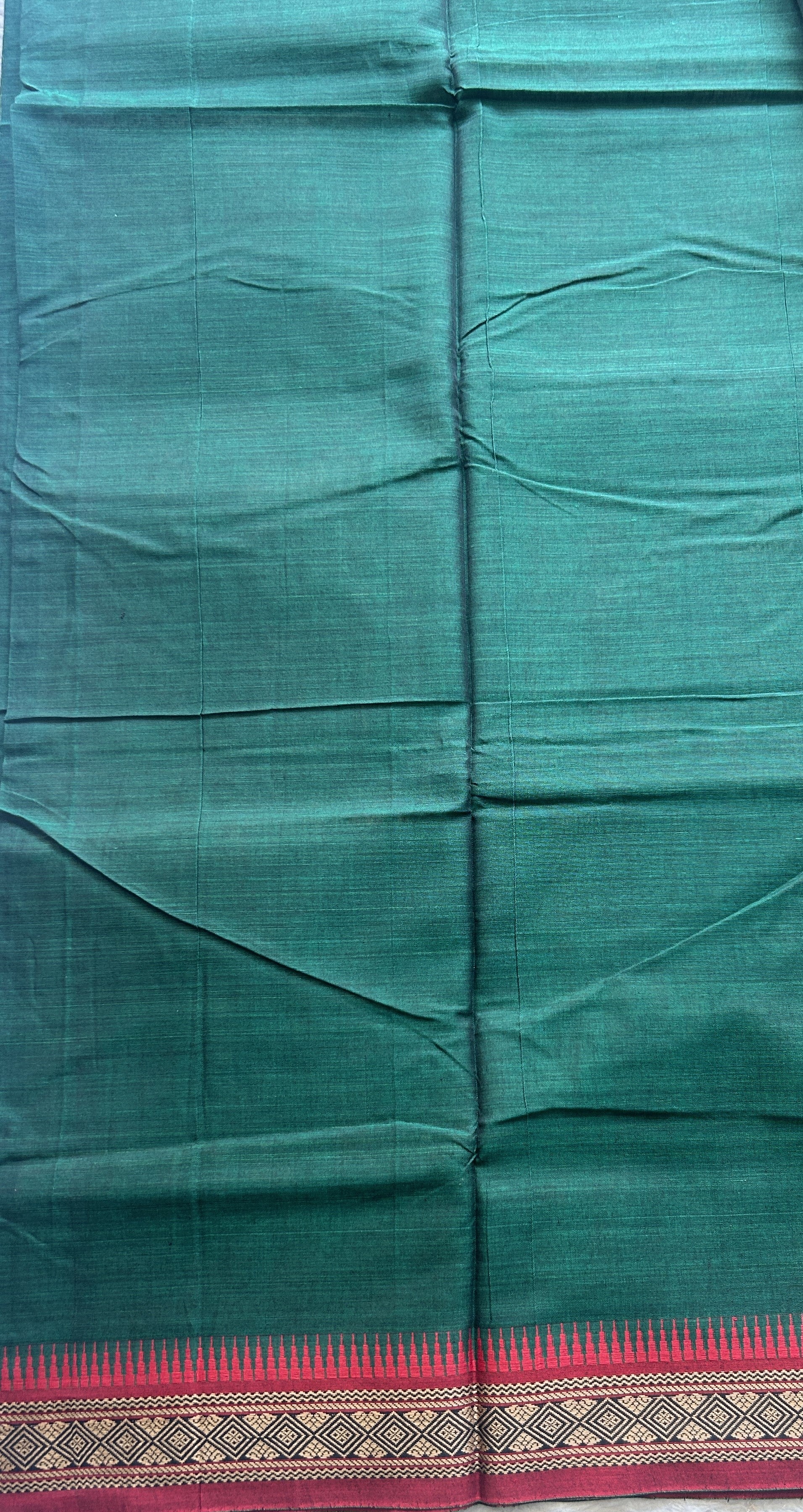 Narayanpet Cotton Saree Bottle Green Colored Complemented with a Thread Border. - Sampradaya Designer Studio