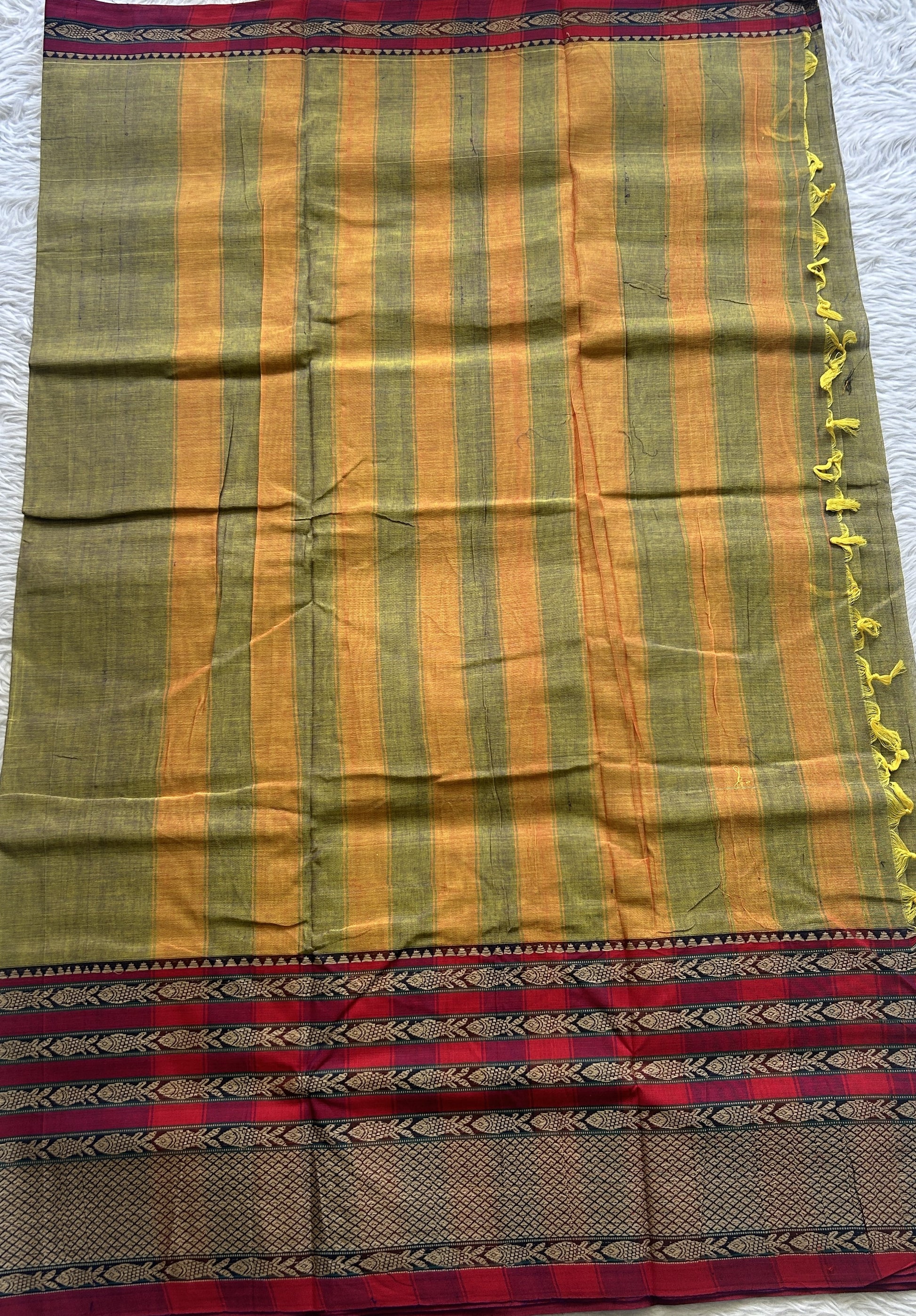 Narayanpet Cotton Saree Avocado Colored Complemented with a Thread Border. - Sampradaya Designer Studio