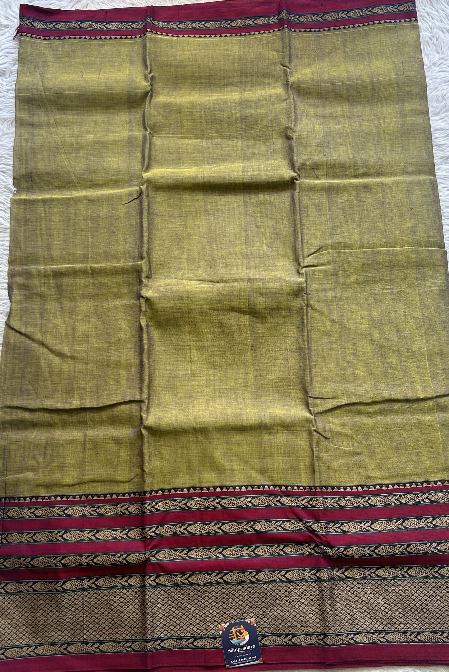 Narayanpet Cotton Saree Avocado Colored Complemented with a Thread Border. - Sampradaya Designer Studio