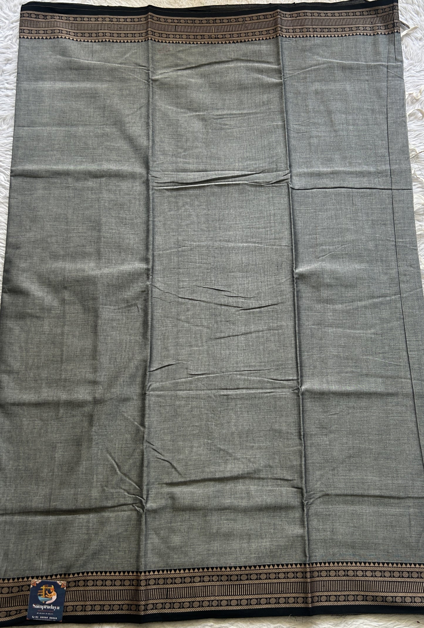 Narayanpet Cotton Saree Ash Colored Complemented with a Black Thread Border. - Sampradaya Designer Studio