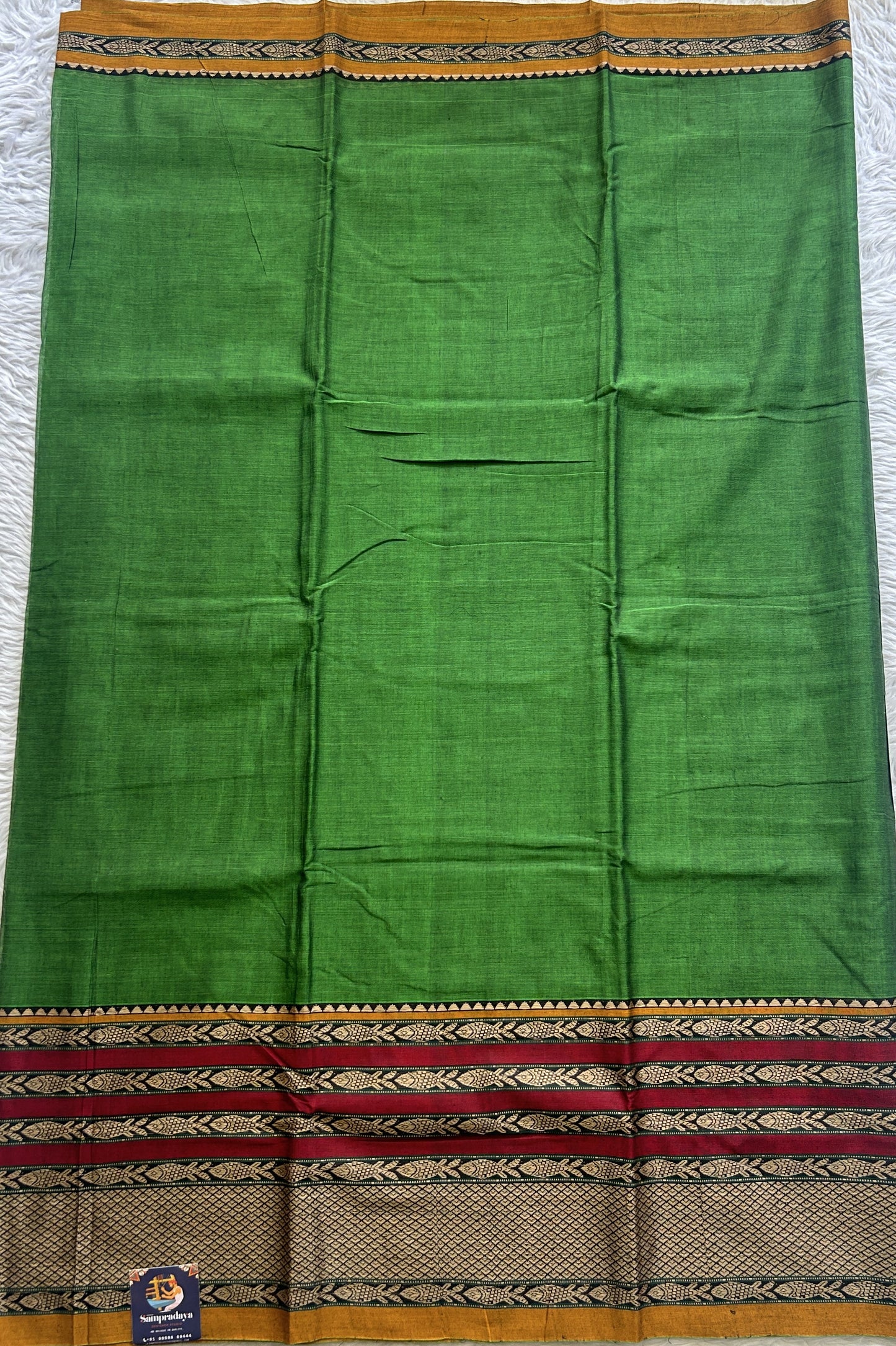 Narayanpet Cotton Saree Leaf Green Colored Complemented with a Minakari Thread Border. - Sampradaya Designer Studio