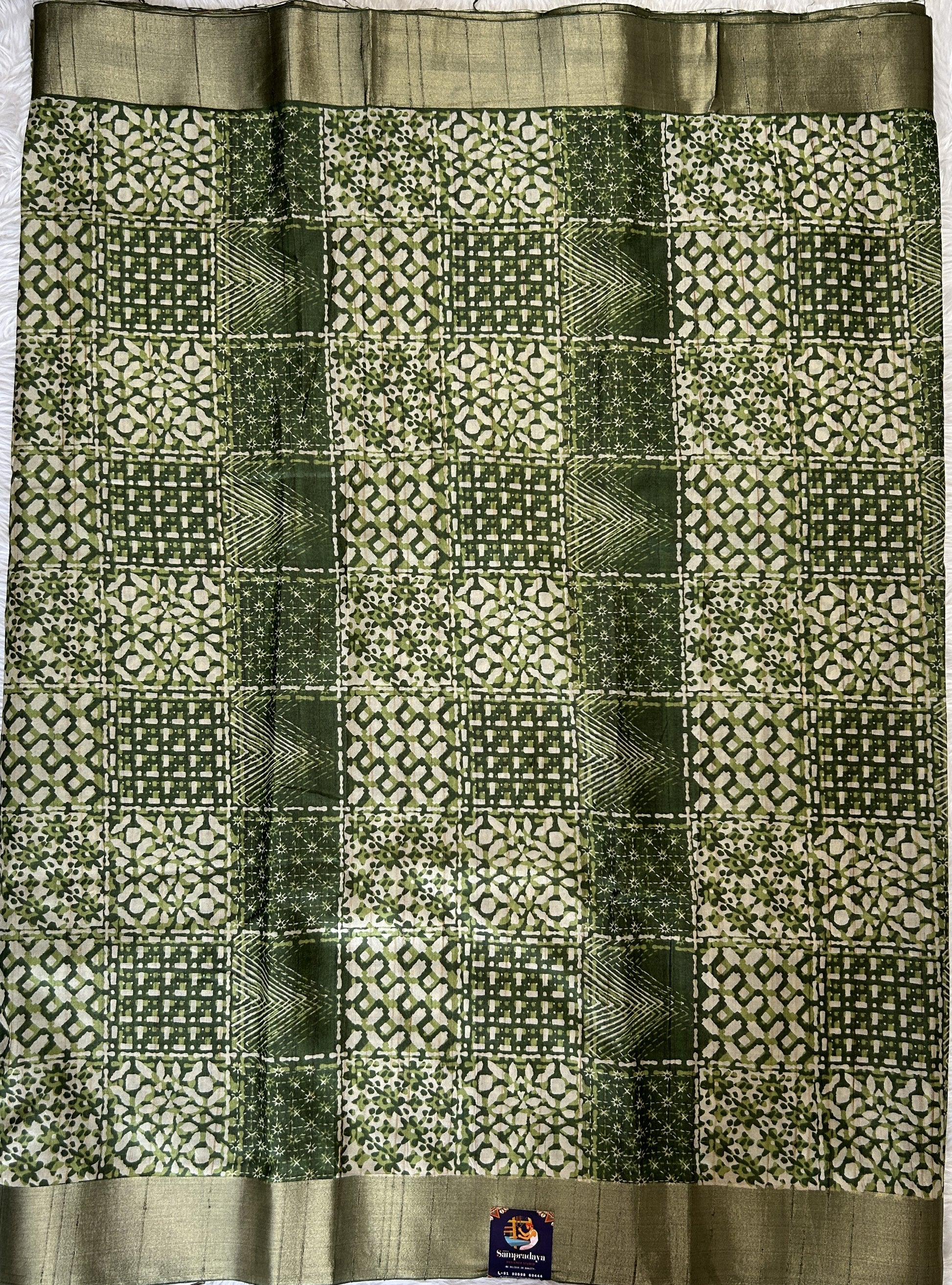 Semi Tussar Saree Green Color Complemented with a Zari Border. - Sampradaya Designer Studio