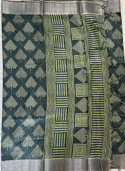Semi Tussar Saree Dark Bottle Green Color Complemented with a Zari Border. - Sampradaya Designer Studio