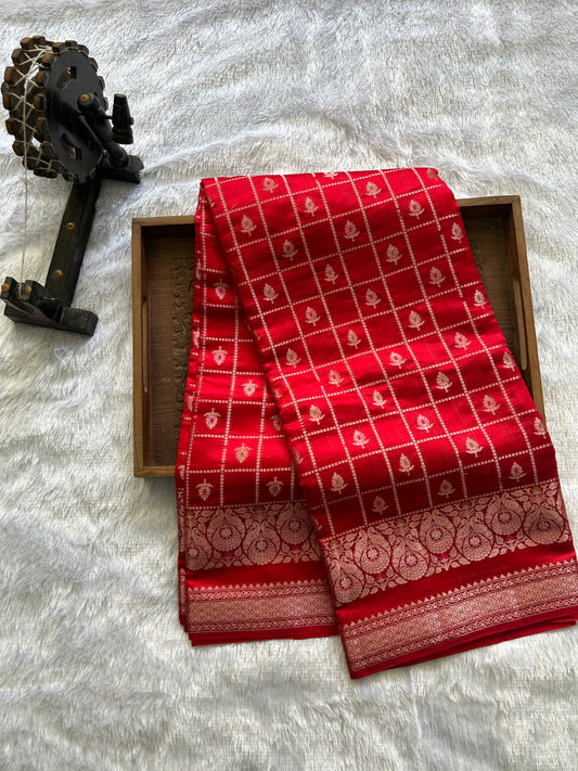 Pure Chiniya Silk Saree Red Colored Elegantly Paired with a Gold Zari Border.