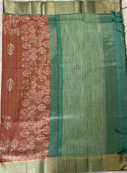 Semi Tussar Saree Rust Color Complemented with a Sea Blue Zari Border. - Sampradaya Designer Studio