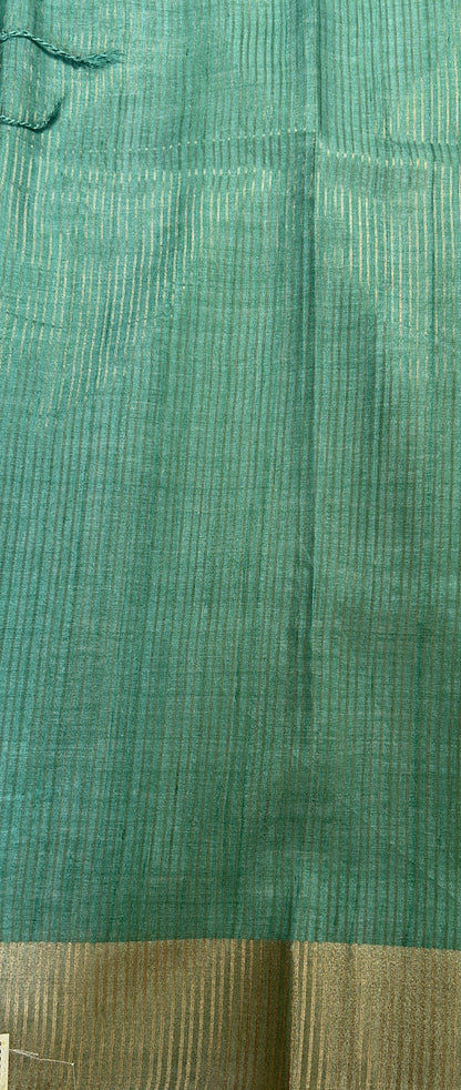 Semi Tussar Saree Rust Color Complemented with a Sea Blue Zari Border. - Sampradaya Designer Studio