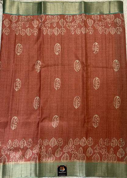 Semi Tussar Saree Rust Color Complemented with a Sea Blue Zari Border. - Sampradaya Designer Studio
