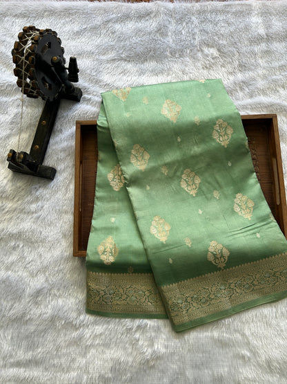 Pure Chiniya Silk Saree Sea Green Colored Elegantly Paired with a Gold Zari Border.