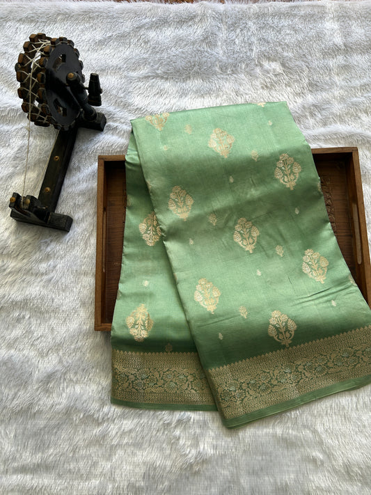 Pure Chiniya Silk Saree Sea Green Colored Elegantly Paired with a Gold Zari Border.
