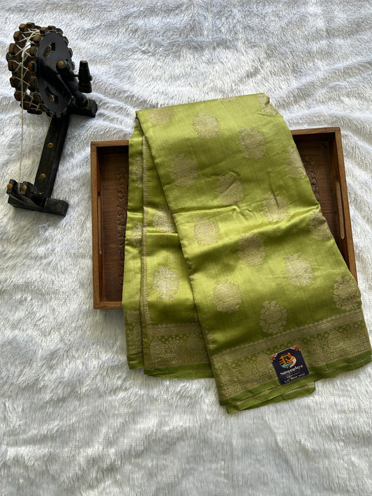 Pure Chiniya Silk Saree Mint Light Green Colored Elegantly Paired with a Gold Zari Border.