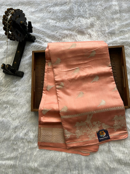 Pure Chiniya Silk Saree Peach Colored Elegantly Paired with a Gold Zari Border.