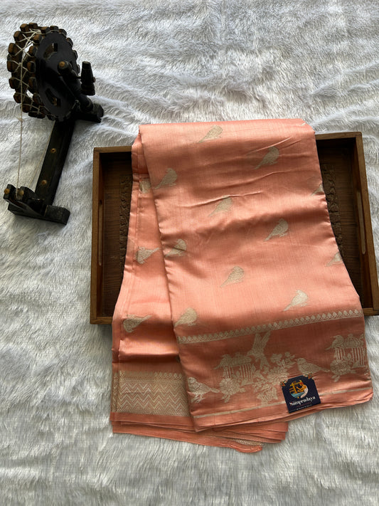 Pure Chiniya Silk Saree Peach Colored Elegantly Paired with a Gold Zari Border.