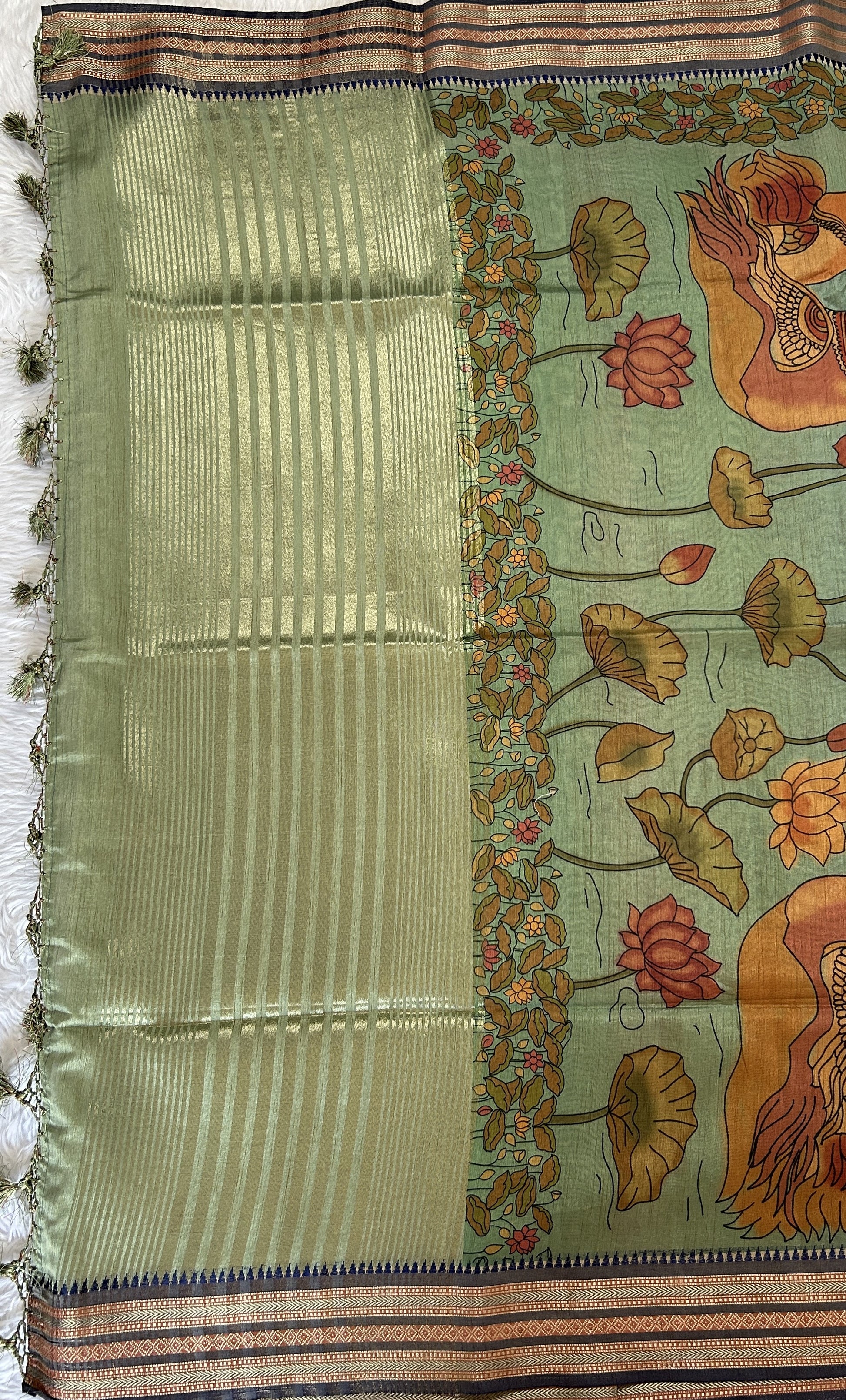 Semi Tussar Saree Sea Green Color Complemented with a Ink Blue Zari Border. - Sampradaya Designer Studio