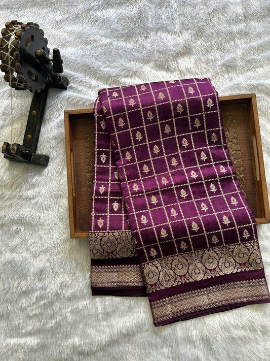 Pure Chiniya Silk Saree Violet Colored Elegantly Paired with a Gold Zari Border.