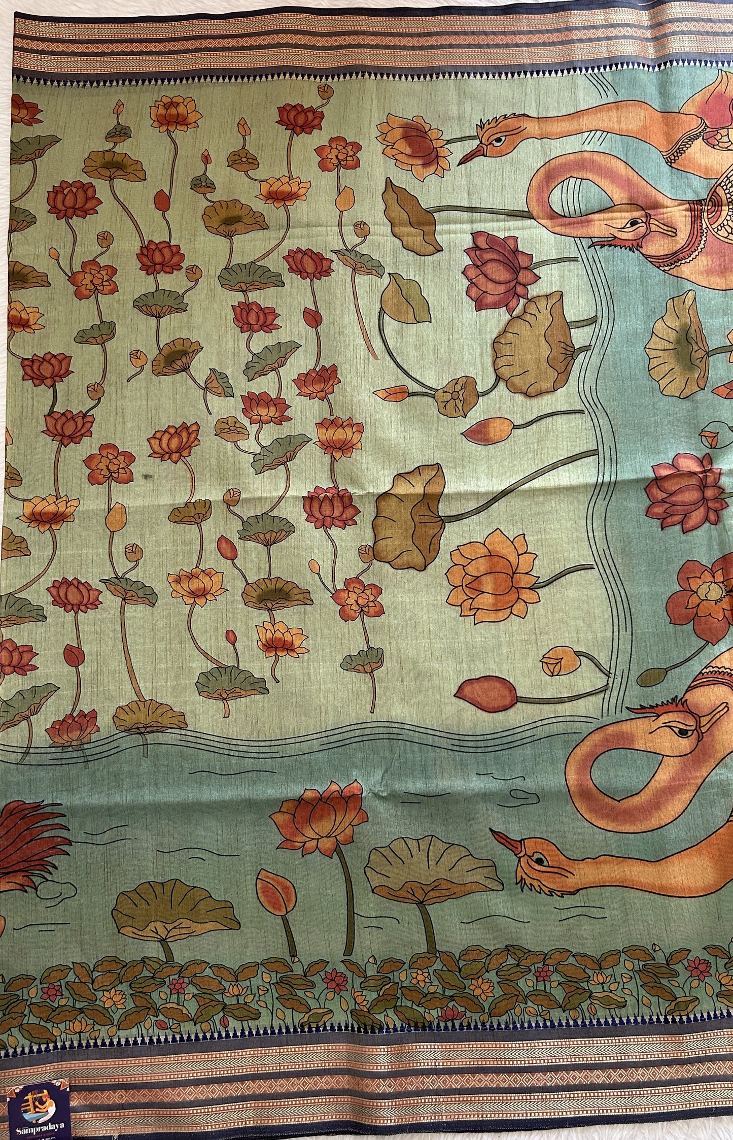 Semi Tussar Saree Sea Green Color Complemented with a Ink Blue Zari Border. - Sampradaya Designer Studio
